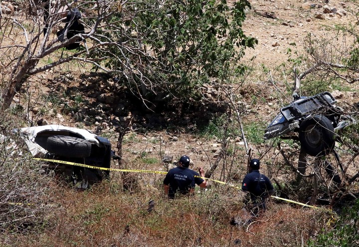 Policía forense trabaja en la zona de un ataque en Tlajomulco de Zuñiga, Jalisco.  Foto: Ulises Ruiz/AFP 